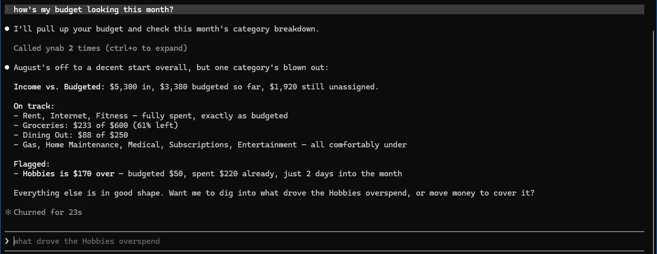 Claude Code answering “how’s my budget looking this month?” by calling the ynab tools twice and summarizing the demo budget: income, category spending, and one overspent category flagged